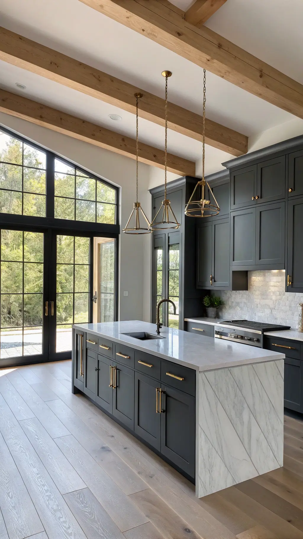 Modern dark grey kitchen with matte charcoal cabinets, white quartz waterfall island, brass pendant lights, and marble herringbone backsplash. Morning light streams through floor-to-ceiling windows, highlighting exposed wooden beams and wide-plank white oak floors. Warm LED under-cabinet lighting adds depth, creating a sophisticated and inviting atmosphere.