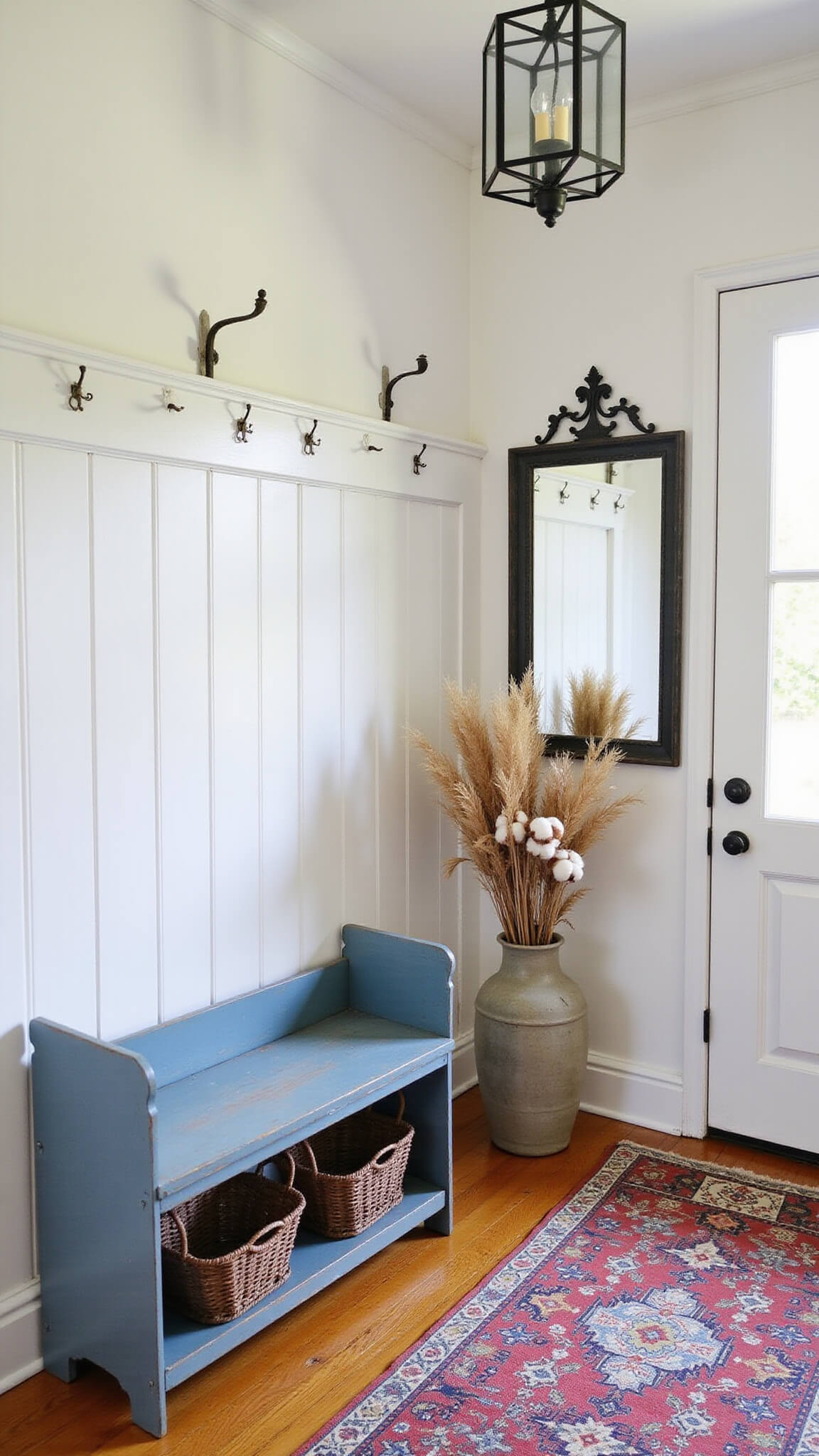 Child's-eye view of a bright farmhouse entry with white board and batten walls, antique blue bench, vintage Turkish runner, and rustic decor.
